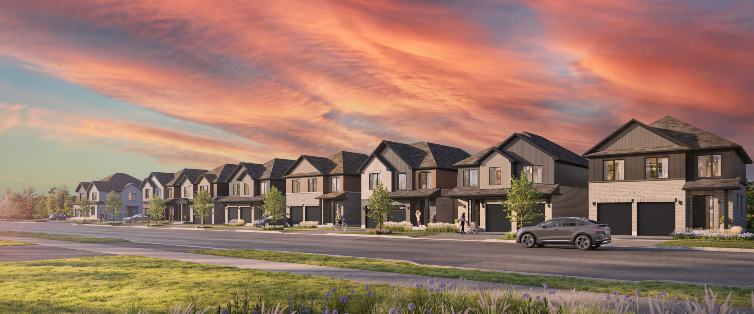 The Attersley sample streetscape along Robert Attersley Drive, featuring single detached home models: The Dunlop, The Champion, The Archivist, The Mayoral, and The Olympian